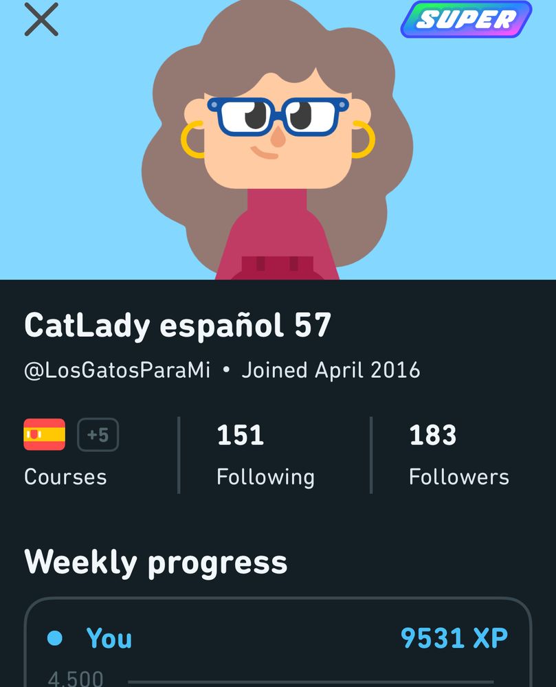 Screenshot of a profile on Duolingo language learning 
app shows a woman with brown hair and eyeglasses at top. 
