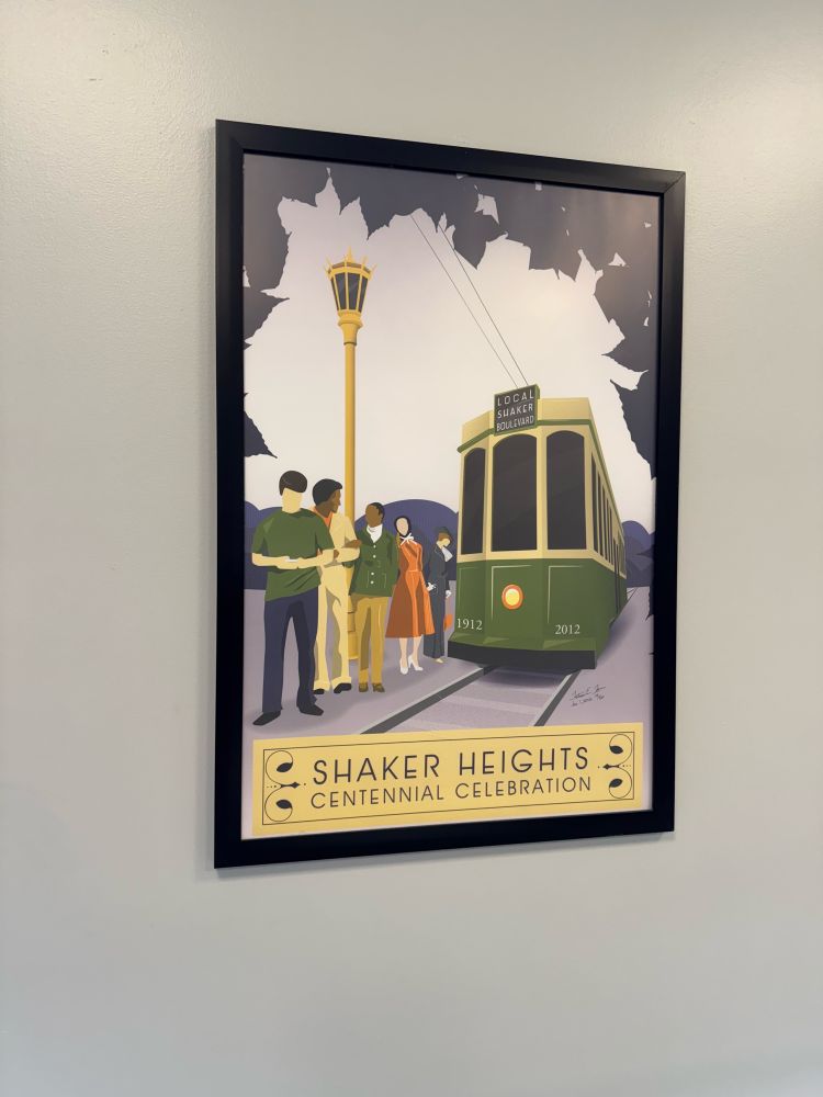 Poster depicting a trolley car with people wearing clothing from different periods of the last 100 years. The main color palette is dusty yellow, green, orange and shades of navy blue.