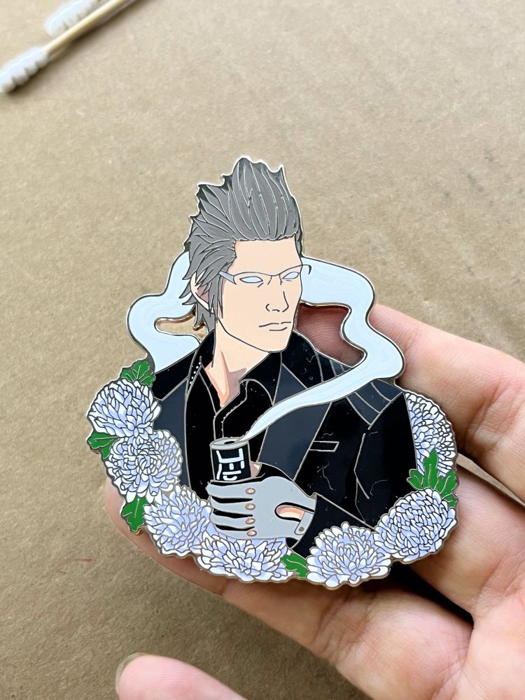 Enamel pin of Ignis without face screenprinting.