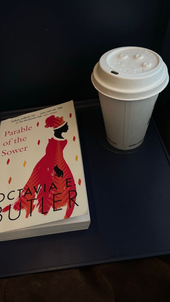 Octavia Butler’s Parable of the Sower and a paper cup of tea on a train in Germany.