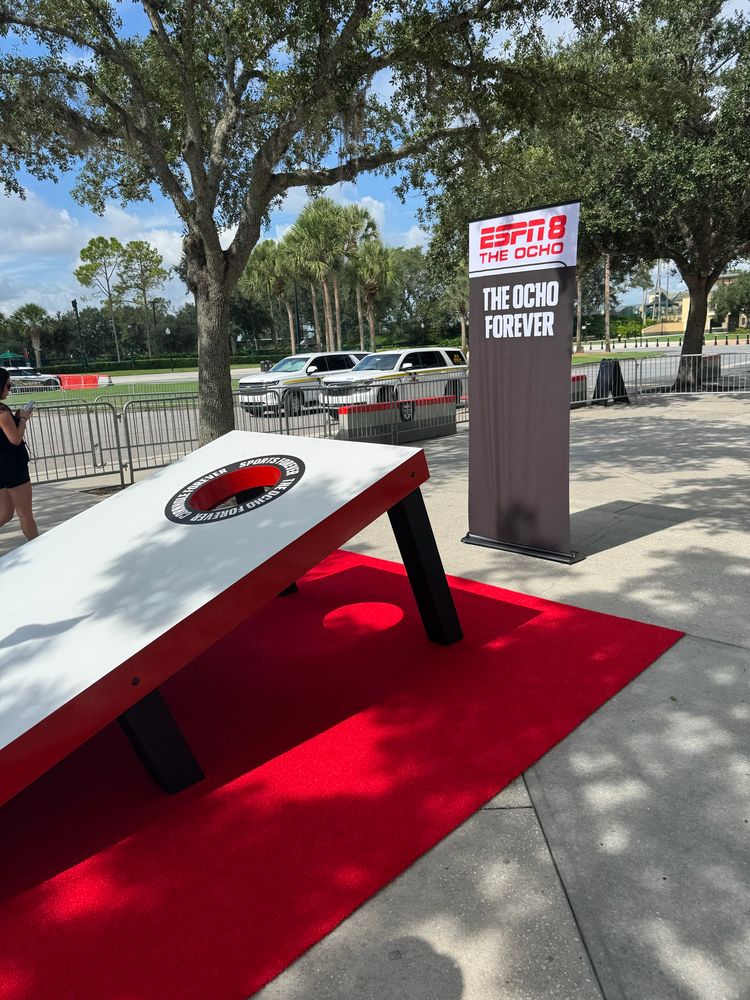 A giant cornhole set at the entrance to ESPN Wide World of Sports 