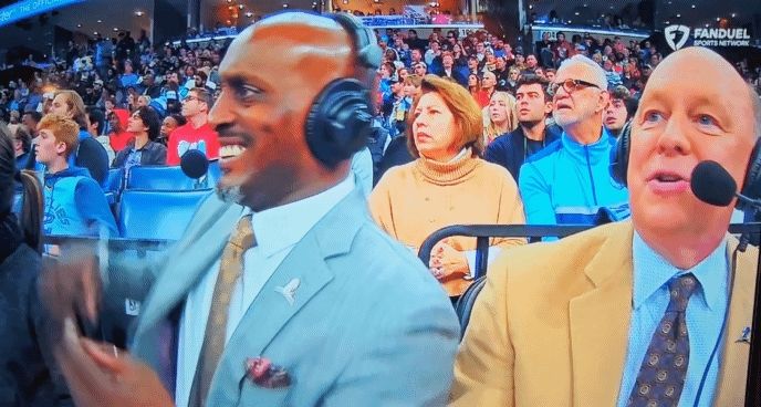 Broadcaster Brevin Knight enthusiastically celebrates a John Konchar eurostep