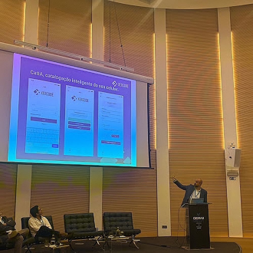 Panel members at the 3rd Koha Portugal conference sitting on chairs answering questions and presenting