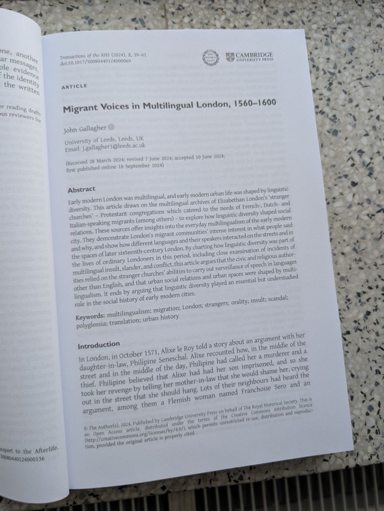 The journal opened to the first page of my article in paper form. 