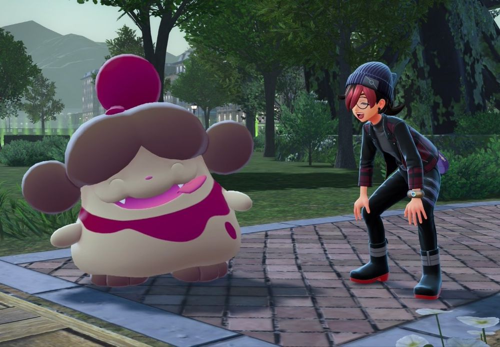 A screenshot of Pokemon Legends ZA featuring my trainer crouching with Pubby, the Shiny Alpha Slurpuff