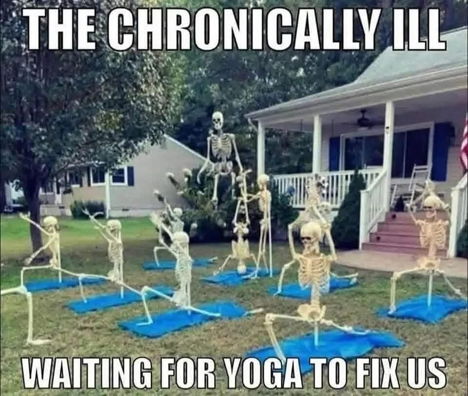 Skeletons in yoga poses on a lawn of a house