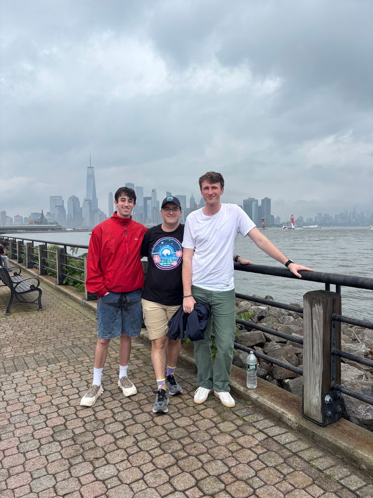 John, me and JD posing with the NYC skyline