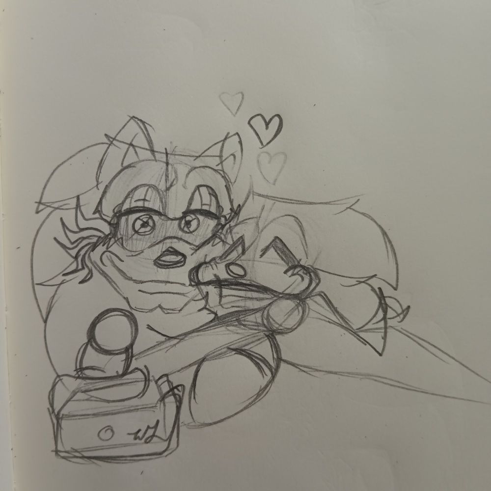Lord X & Majin laying on the couch, watching television, cuddling