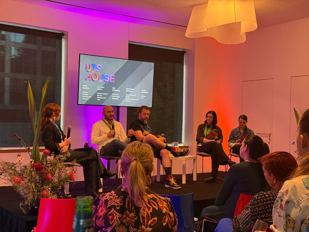 Five people on a panel stage discussing games industry challenges. Audience members in foreground.

Screen in rear says “UTS HOUSE
Chloe Appleby, Games Curator Powerhouse Museum
Dr. Jaime Garcia, Senior Lecturer Game Development UTS
Ben Armstrong, Game and Technology Specialist
Ally McLean-Hennessy, Game Director &
Writer, Mystiques Haunted Antiques
Lauren Szmandiuk, Student UTS”