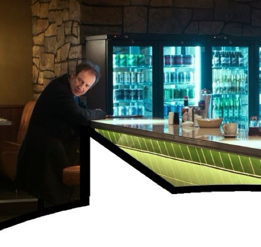 David Thewlis as John Dee in a diner, from “The Sandman” Ep. 5