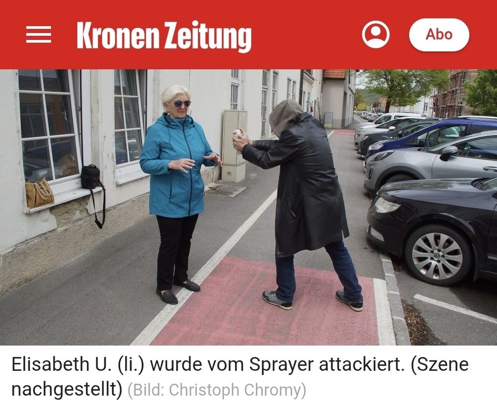 Foto einer nachgestellten Szene: Sprayer besprayt Frau (Krone)