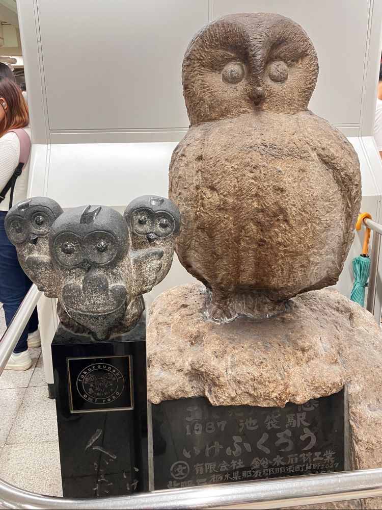 Sculpture of owls inside Ikebukuro station
