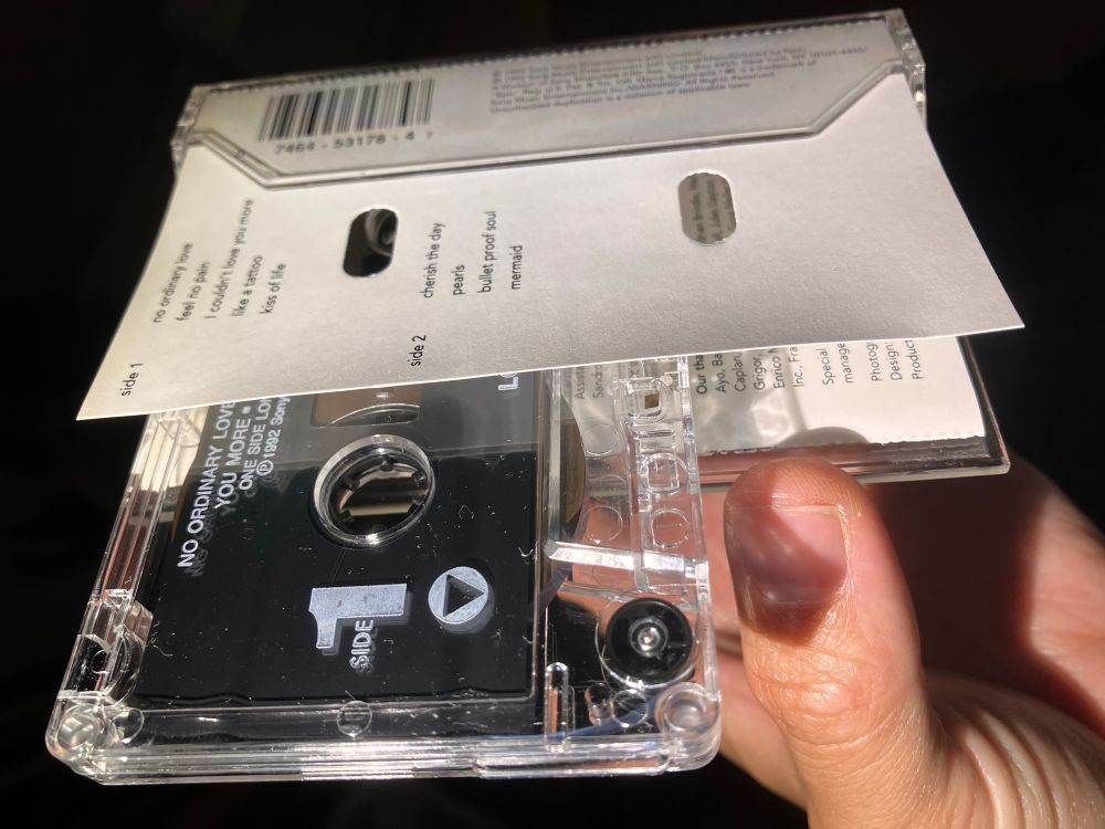 Cassette tape and lyrics insert
