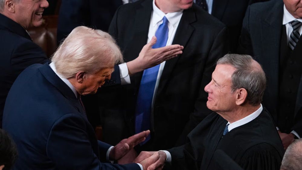 US Supreme Court Chief Justice John Roberts shaking hands with Trump while Trump says 'thank you, thank you again, I won't forget it' after ruling on presidential immunity, forever changing the landscape of the United States separation of powers doctrine.