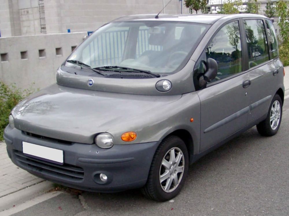 Image of a nickle color Fiat Multipla car which looks like you made a car out of a beluga whale. 