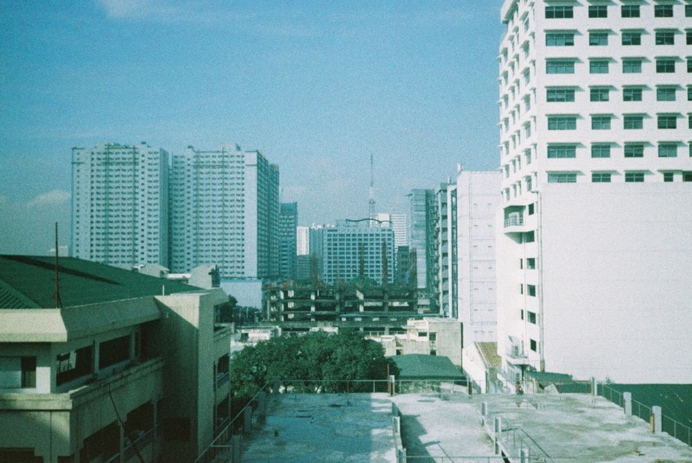 A picture of builds in Quezon City, Philippines, using a film camera.