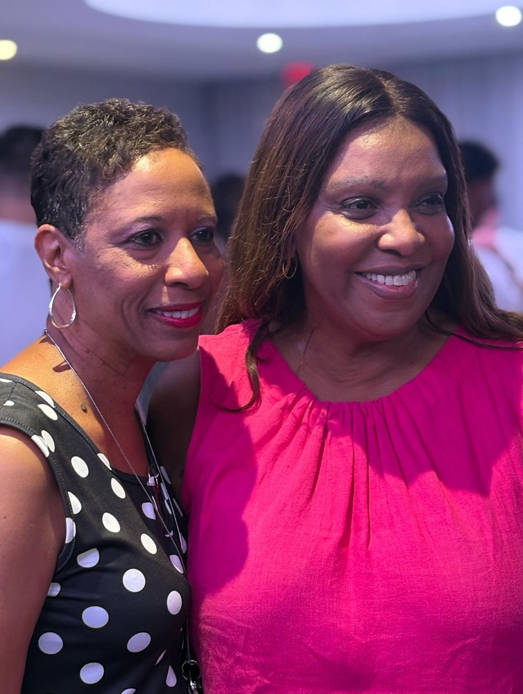 Tish James smiling with Speaker Adams