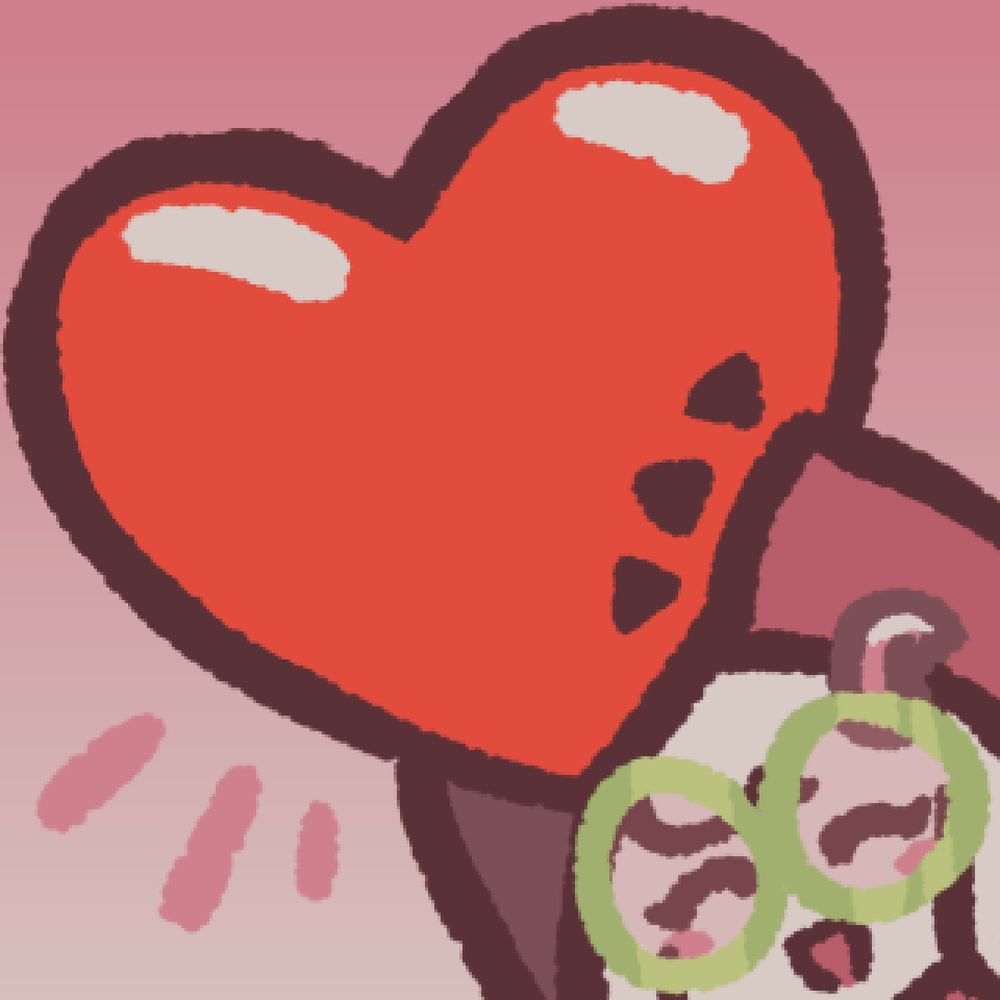 Ralsei is joyfully holding up a red shiny heart over his head.