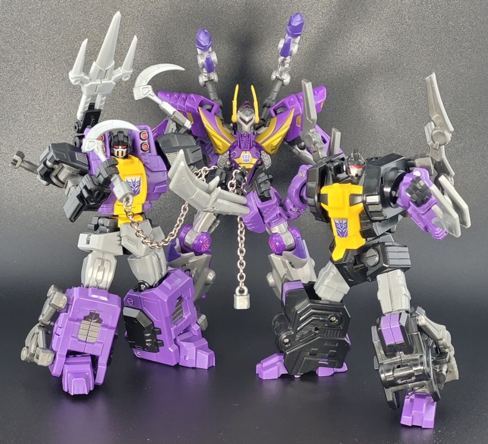 I've had WFC Kickback for years, but finally pounced on Fansproject's Thundershred (Shrapnel) and Stormbomb (Bombshell). Do they match? Not really. But Kickback needed his team, and of the FP Causality Insecticons, I found their version of Kickback to be the least interesting, so I'm cramming the two teams together. It works for me.

Maybe it's because it's Halloween, but I keep thinking of Nightmare Before Christmas with these guys. 

"What are YOU doing here?!"
"Megatron sent for us!"
"Specifically, specifically~"
"Lock!"
"Shock, Shock...!"
"And Barrell!" 
