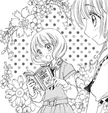 Girl in manga holding the grimoire Liber Ivonis.