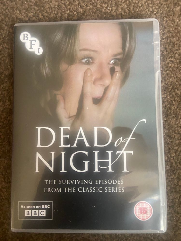 DVD cover for’Dead of Night’, showing a woman recoiling in terror 