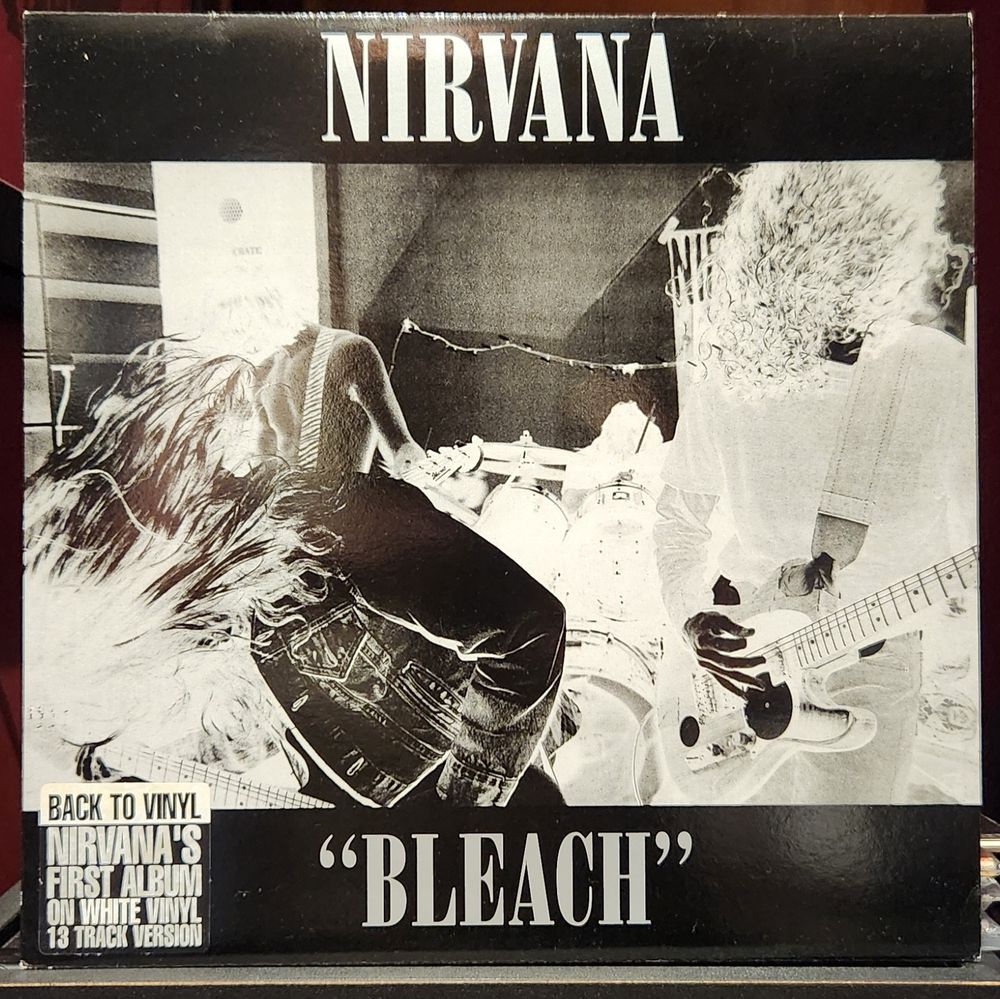 cover art for the 2002 white vinyl reissue of nirvana's debut lp, bleach, on subpop records 