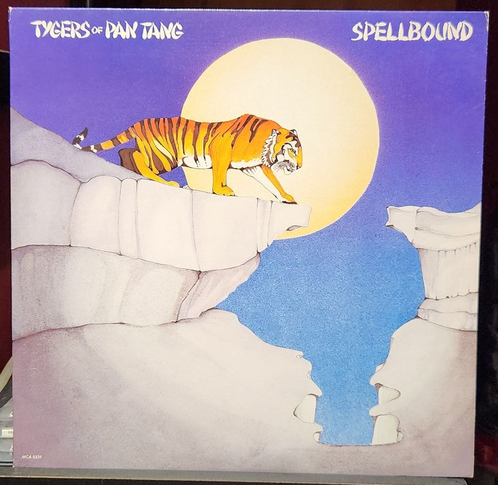 cover art for the 1981 vinyl lp of thr tigers of pan tang's second album,  spellbound, on mca records 