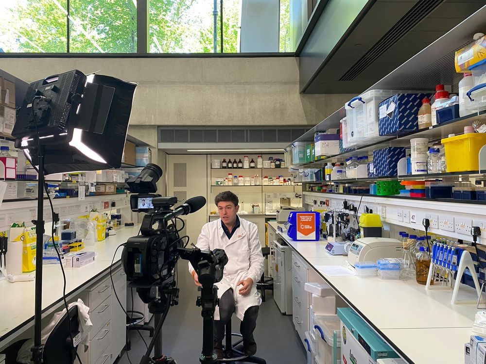 Dr Jon Fisher being interviewed in the UCL lab at the Great Ormond Street Institute of Child Health.