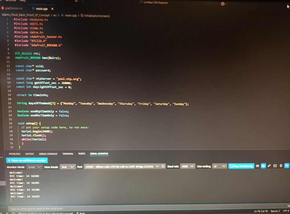 A picture of some of the code of the initial proof of concept program in VS Code, with the serial monitor open with the current date and time being sent across by the ESP32.