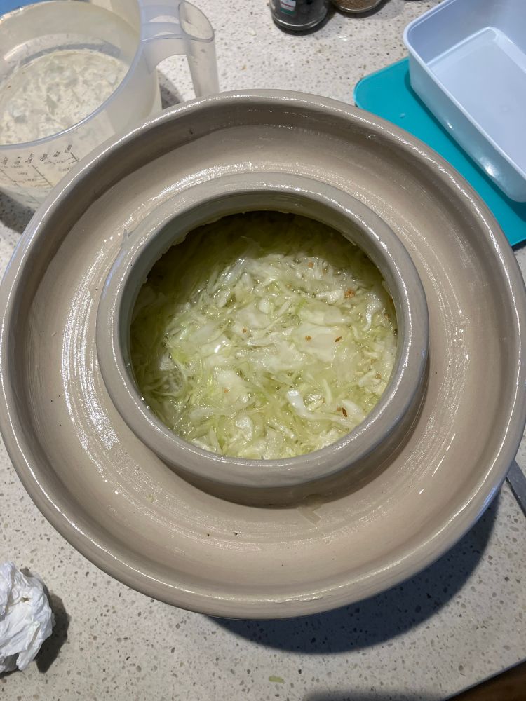 Pot vullen en aandrukken 