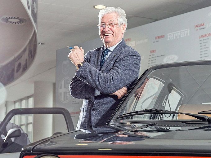 Giorgetto Giugiaro smiling with a pen on his hand. Buon compleanno, maestro!