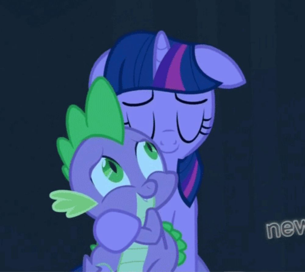 spike and twilight sparkle from my little pony are hugging each other