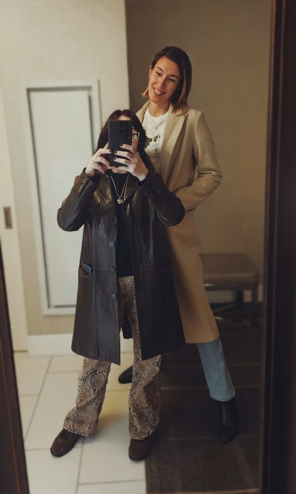 Two hot queens in a mirror and trench coats 🪞 