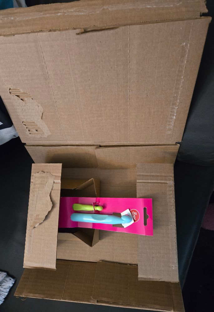 2 small crochet needles packaged in a box that is too large from Amazon.