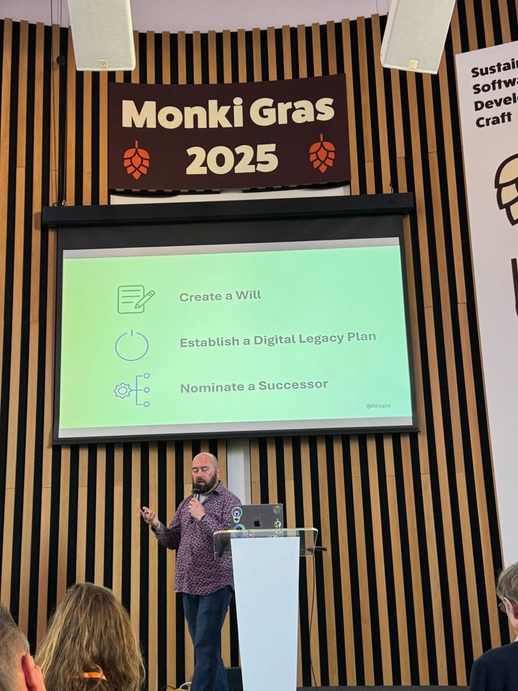 Fintan Ryan on stage with some very wise words at Monki Gras 2025.  Create a will. Establish a digital legacy plan. Nominate a succesor.

