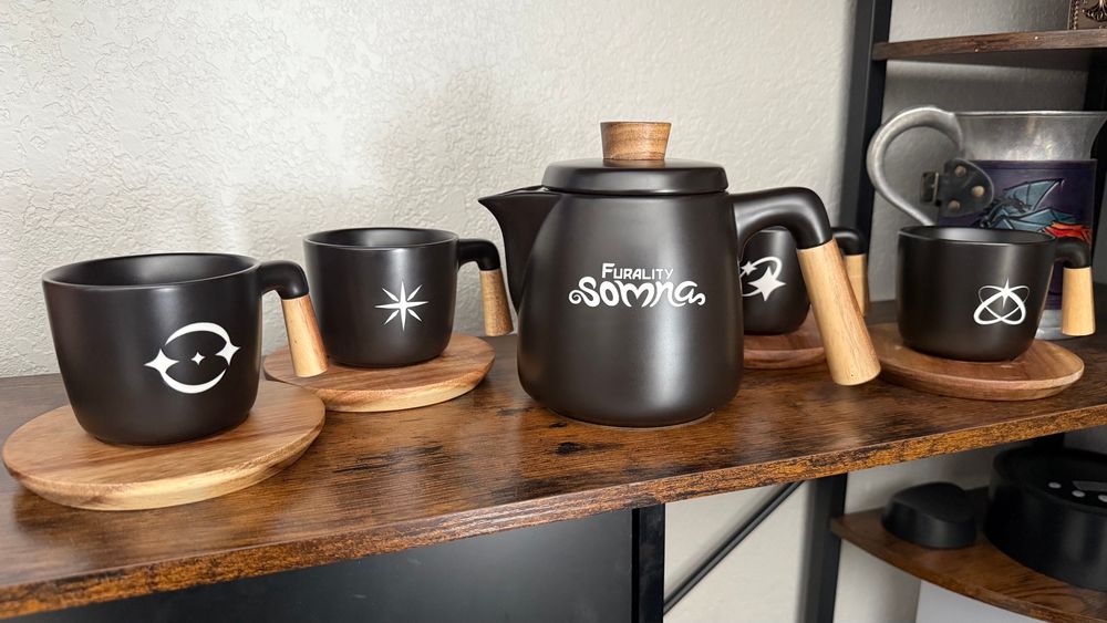Furality Somna tea set, in black matte ceramic, with Somna themed white engraving.