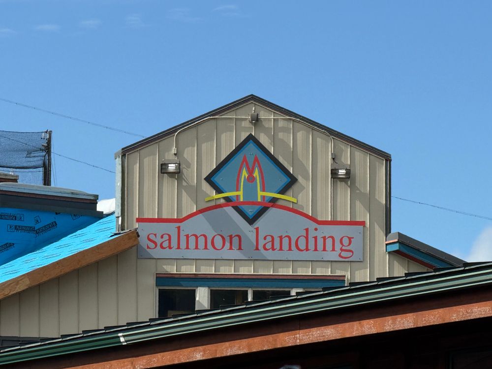 A sign reads “Salmon Landing”