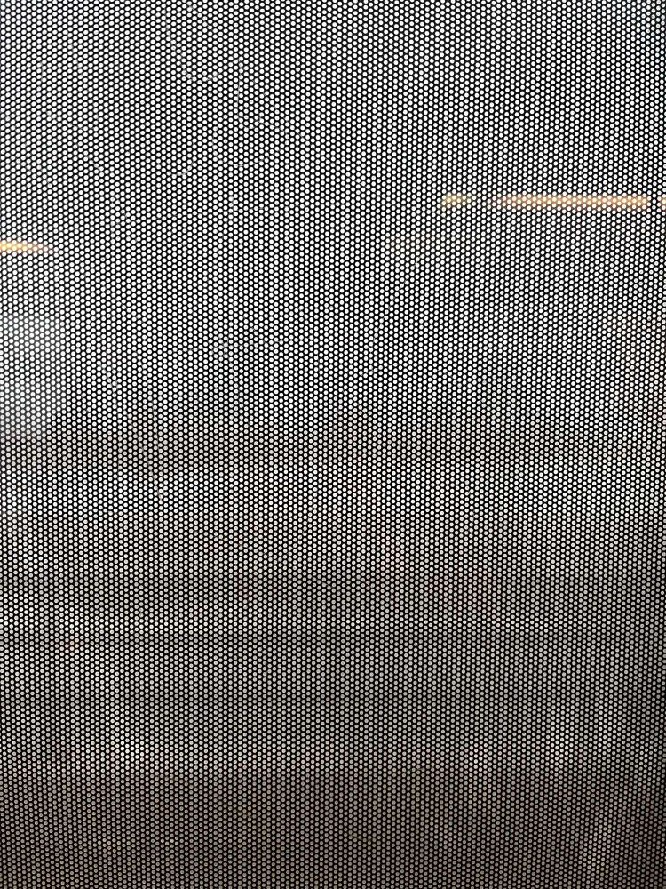 A blurry view of a city from a subway car window 