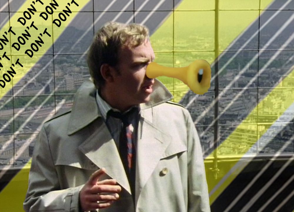 A picture of Duggan from the Doctor Who story "City of Death", sporting a yellow horn like nose, against a mixed background of Paris and yellow and black stripes with the word "don't" repeated diagonally.