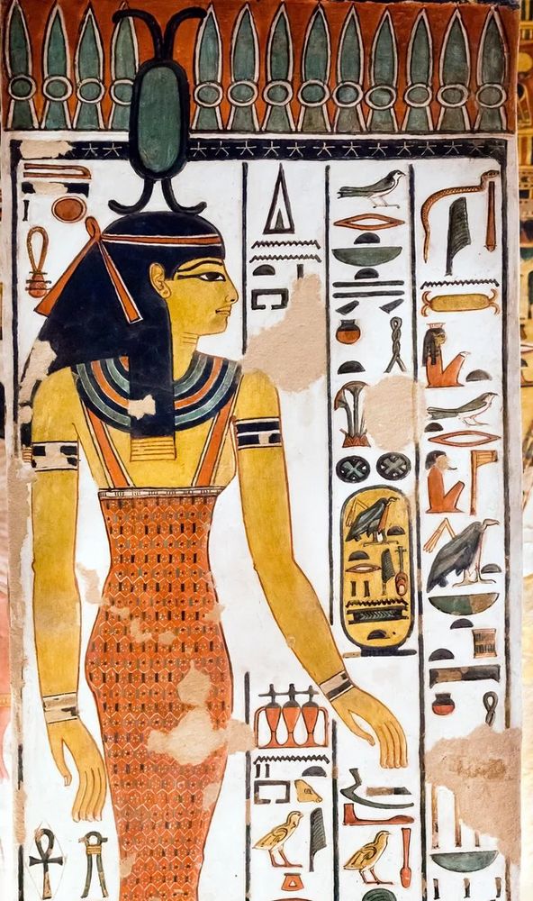 Image of the goddess Neith from the tomb of Queen Nefertari (19th Dynasty). She wears a beaded dress and on her head is a lozenge-shaped symbol thought to represent two bows.