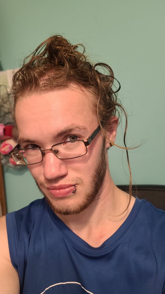 I'm half pouting, half trying to smolder at my camera with disheveled hair and my glasses have slid down my nose.