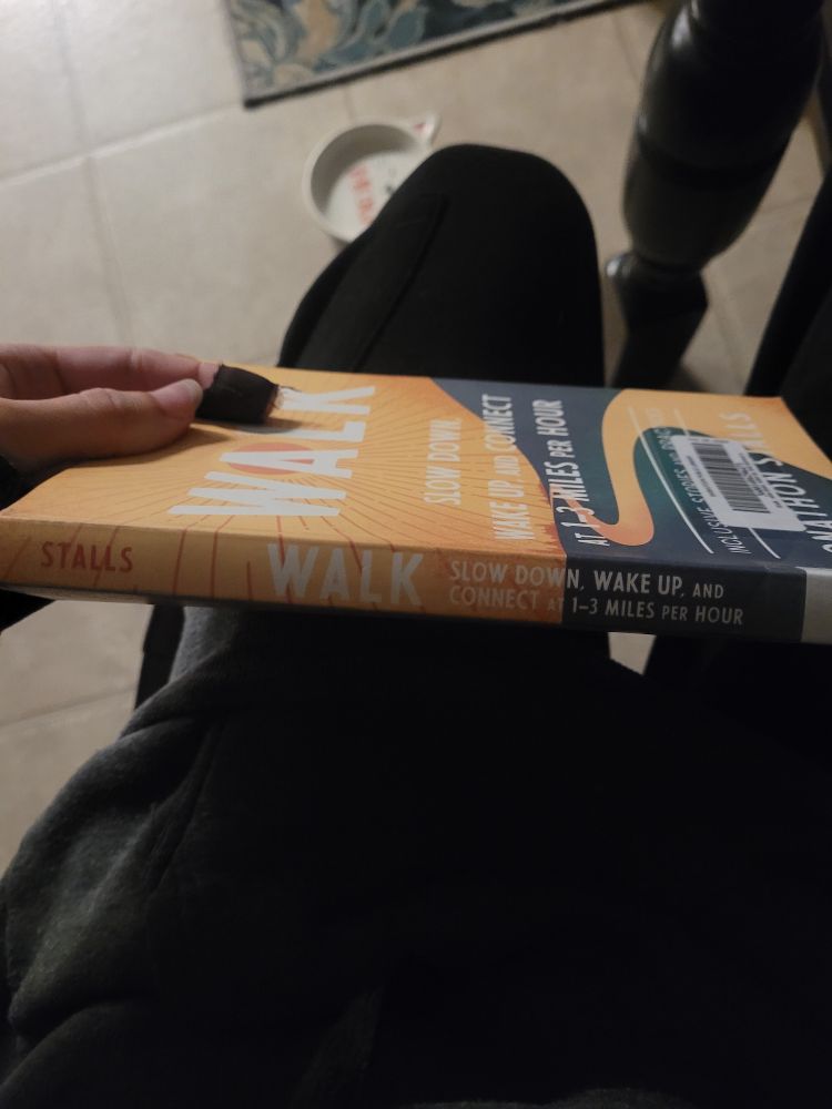 The spine of a book called:
Walk: Slow Down, Wake Up, and Connect at 1-3 Miles Per Hour
Jonathon Stalls