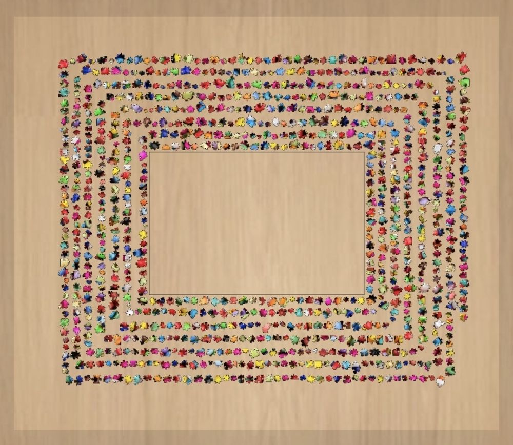 A new, scrambled jigsaw in a mobile app, waiting to be put together. The colours are wildly chaotic. 