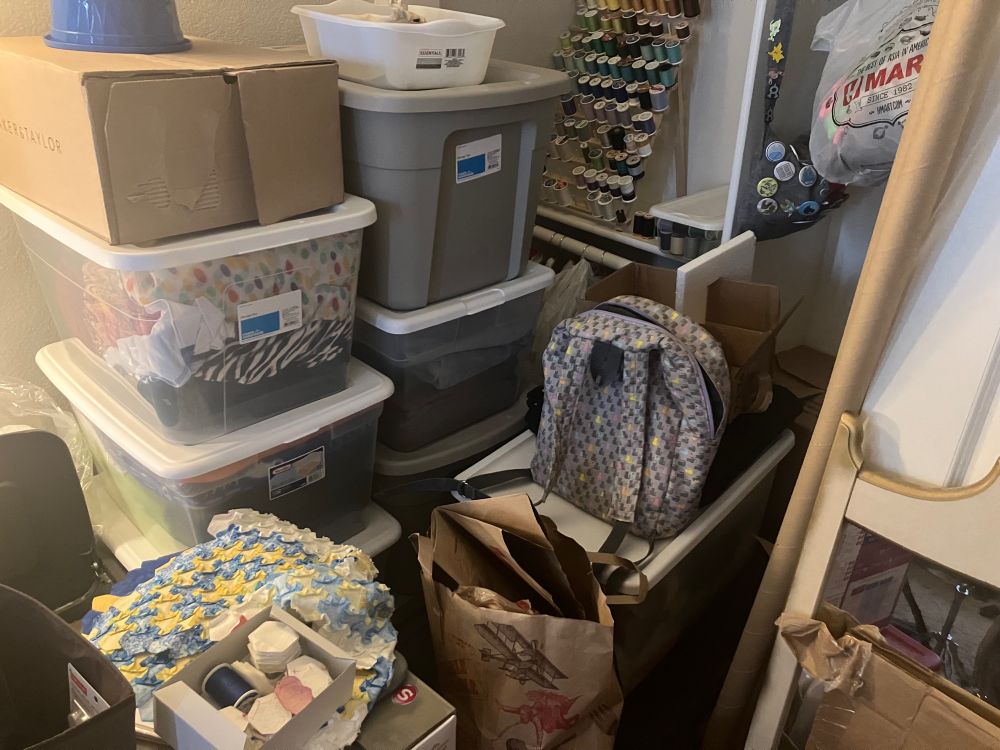 world’s messiest craft corner. (psst: featuring Void leather (he is inside out) in the white tub at the top of the stack! Hi Void!!)