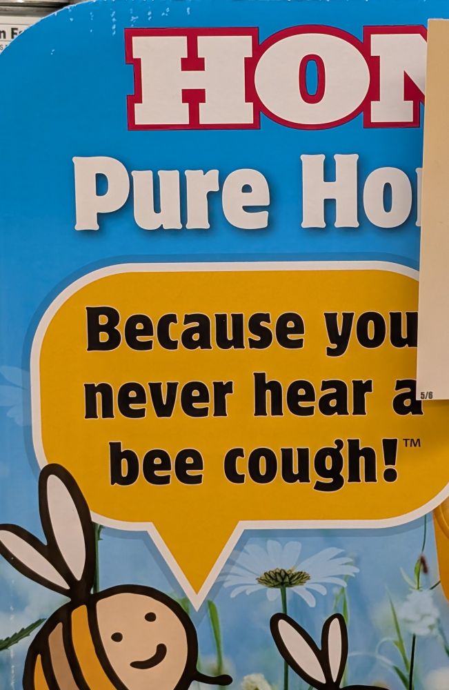 Sign for a pure honey cough drop that has a drawing of a bee that says "because you never hear a bee cough"