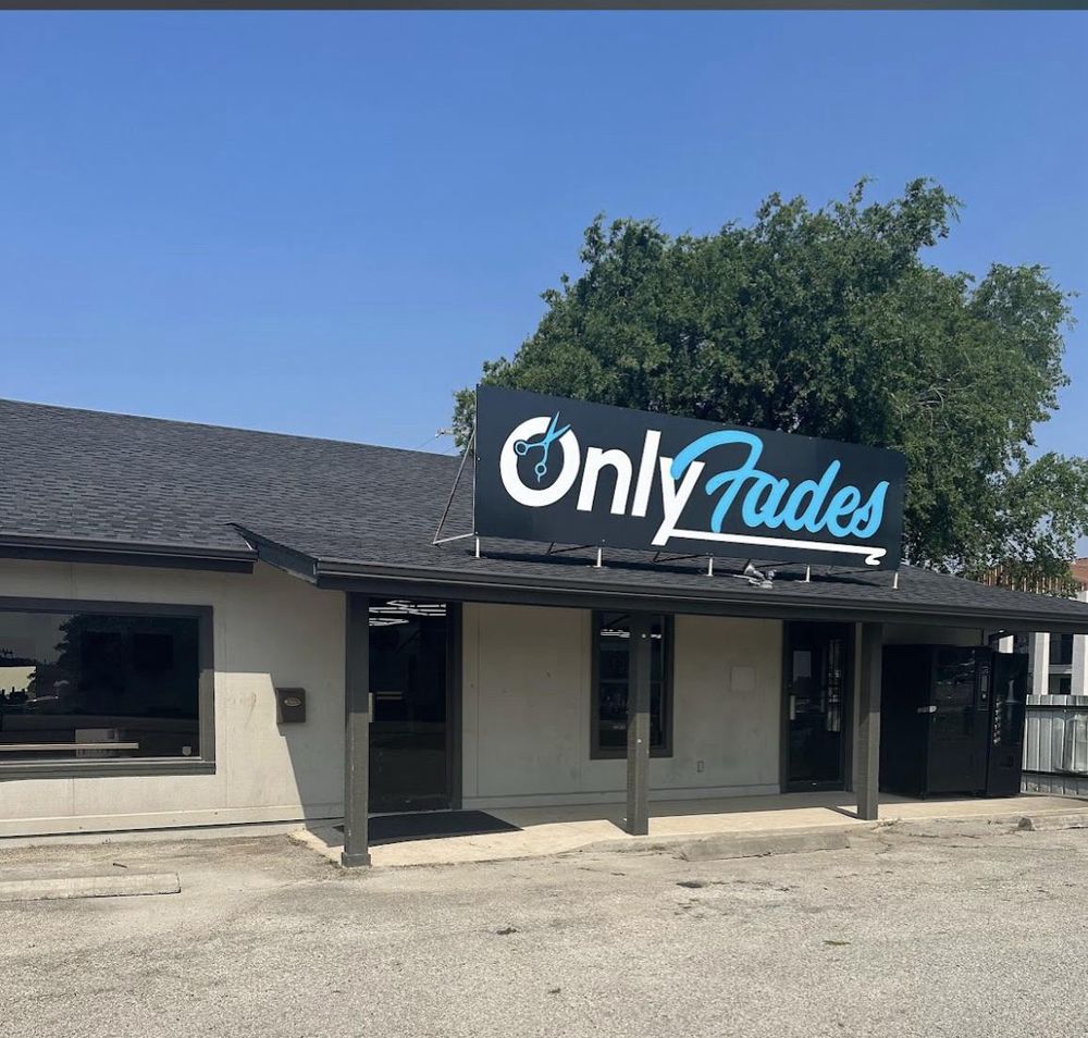 A barbershop called OnlyFades. The sign is a parody of OnlyFans