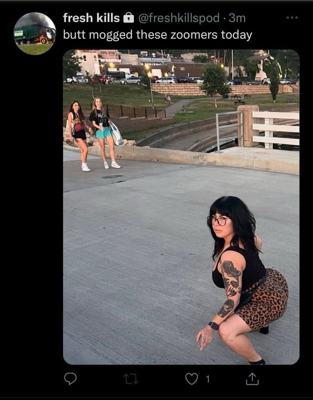 Madison Lynn squatting across the street from a couple of teenagers who do not know she is there, with the caption “but mogged these zoomers today”