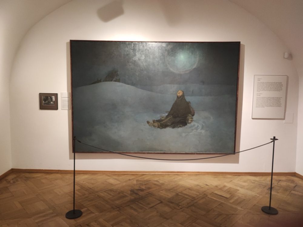 Mucha paint named Star which portrays a woman in the middle of a snowy field under the moonlight accepting her fate as wolves are moving towards her