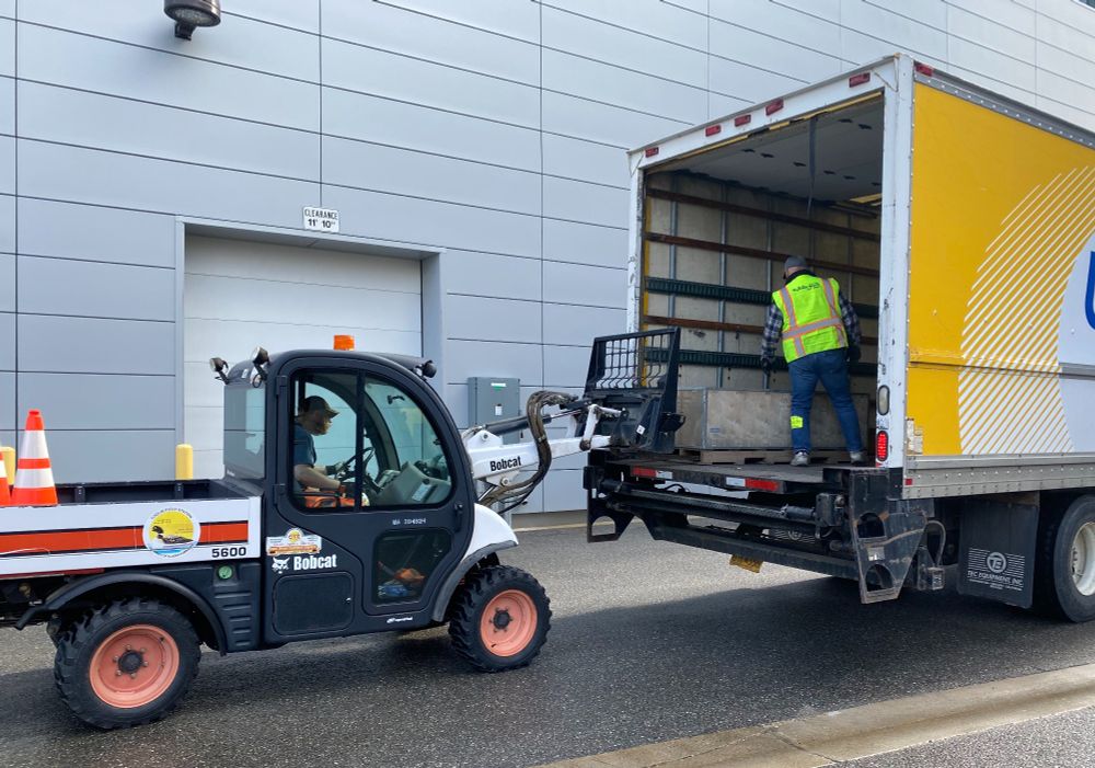 logistics assistant Matt loading freight into truck to send north to Toolik Field Station