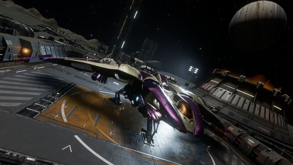 Screenshot from Elite Dangerous. A Mandalay painted in purple and beige landed on a surface outpost with a gas giant visible in the sky behind